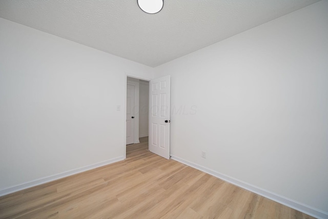 1874 Fleming Rd, Columbus, OH 43232 - spare room featuring light wood-style flooring and baseboards