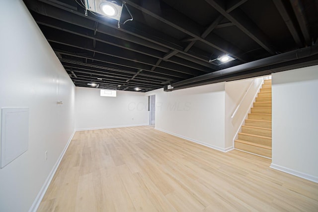 1874 Fleming Rd, Columbus, OH 43232 - finished below grade area with wood finished floors and stairs