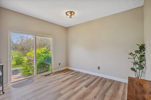 3956 Darby Park Rd, Hilliard, OH 43026 - spare room with light wood-style flooring and baseboards