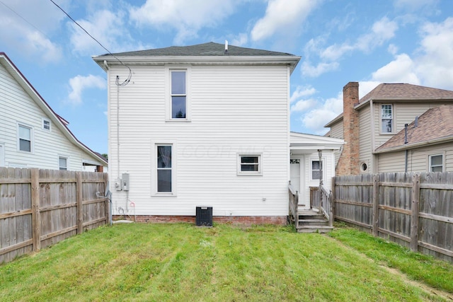 115 E Main St, Mount Sterling, OH 43143 - rear view of house featuring a fenced backyard