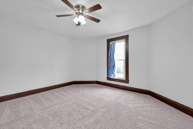 115 E Main St, Mount Sterling, OH 43143 - carpeted spare room with baseboards and ceiling fan