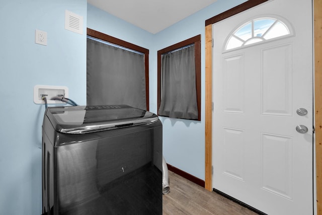 115 E Main St, Mount Sterling, OH 43143 - washroom featuring light wood-style flooring and hookup for a washing machine