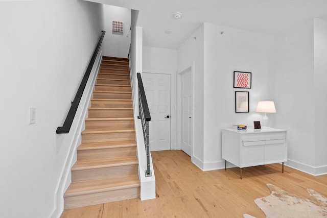 91 W Town St, Columbus, OH 43215 - stairs with wood finished floors and baseboards