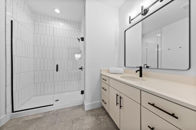 91 W Town St, Columbus, OH 43215 - full bathroom with vanity, a stall shower, recessed lighting, and stone tile floors