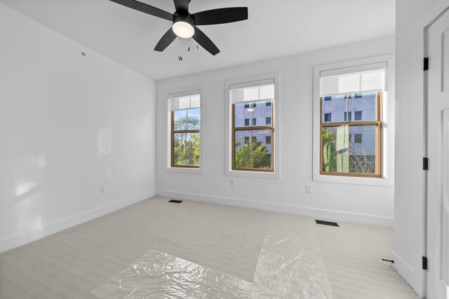 91 W Town St, Columbus, OH 43215 - empty room with carpet flooring and ceiling fan