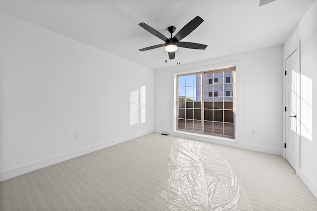 91 W Town St, Columbus, OH 43215 - unfurnished room featuring light carpet and a ceiling fan