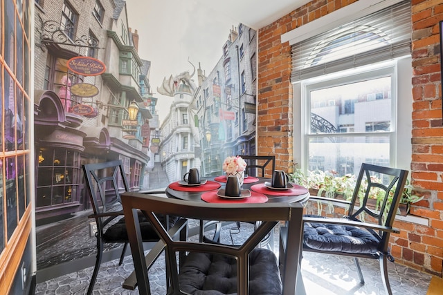 974 N High St Unit B, Columbus, OH 43201 - dining space featuring brick wall