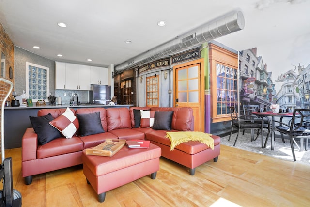 974 N High St Unit B, Columbus, OH 43201 - living room with light wood finished floors and recessed lighting