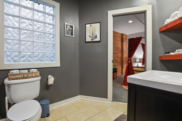 974 N High St Unit B, Columbus, OH 43201 - bathroom featuring tile patterned floors, vanity, and plenty of natural light