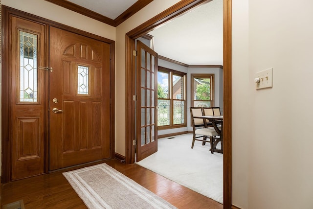 7949 Bluefield St NW, Canal Winchester, OH 43110 - entryway featuring ornamental molding and dark wood-type flooring
