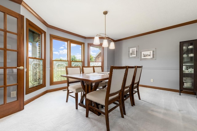 7949 Bluefield St NW, Canal Winchester, OH 43110 - dining space featuring ornamental molding and light carpet