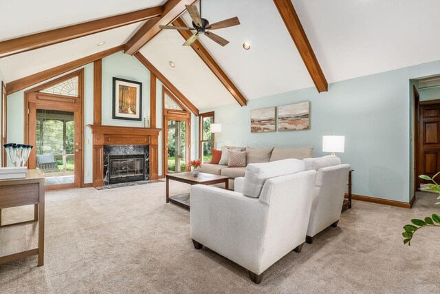 7949 Bluefield St NW, Canal Winchester, OH 43110 - living room featuring light carpet, ceiling fan, beamed ceiling, high vaulted ceiling, and a fireplace