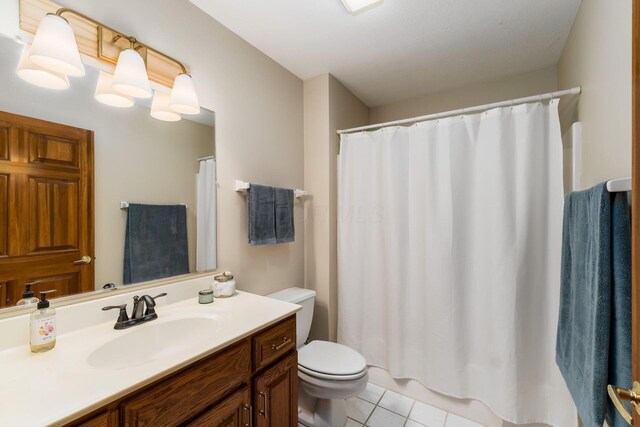7949 Bluefield St NW, Canal Winchester, OH 43110 - bathroom featuring tile patterned floors, vanity, and a shower with curtain