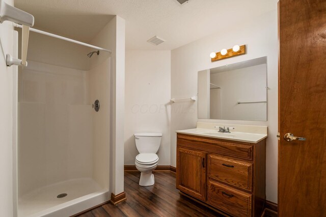 7949 Bluefield St NW, Canal Winchester, OH 43110 - full bath featuring wood finished floors, vanity, and a shower