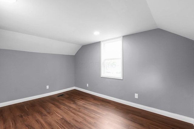 172 Jefferson St, Mount Sterling, OH 43143 - bonus room with lofted ceiling, dark wood finished floors, and recessed lighting