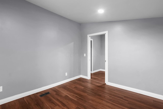 172 Jefferson St, Mount Sterling, OH 43143 - spare room featuring dark wood-style floors and recessed lighting