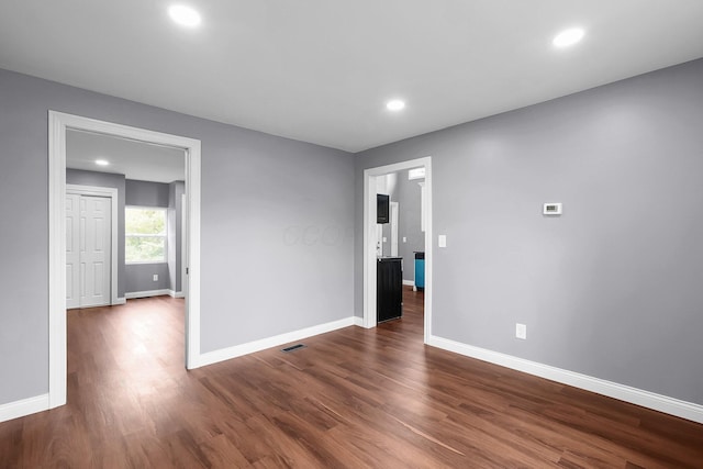 172 Jefferson St, Mount Sterling, OH 43143 - spare room with dark wood-type flooring and recessed lighting