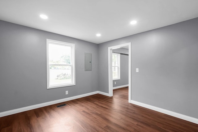 172 Jefferson St, Mount Sterling, OH 43143 - unfurnished room featuring electric panel, dark wood-style flooring, and recessed lighting