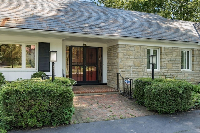 207 Ashbourne Rd, Bexley, OH 43209 - entrance to property with a high end roof and stone siding