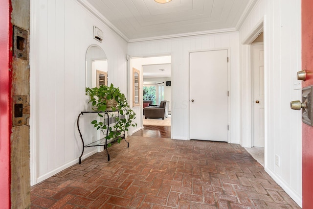 207 Ashbourne Rd, Bexley, OH 43209 - corridor featuring crown molding, brick floors, and wood walls