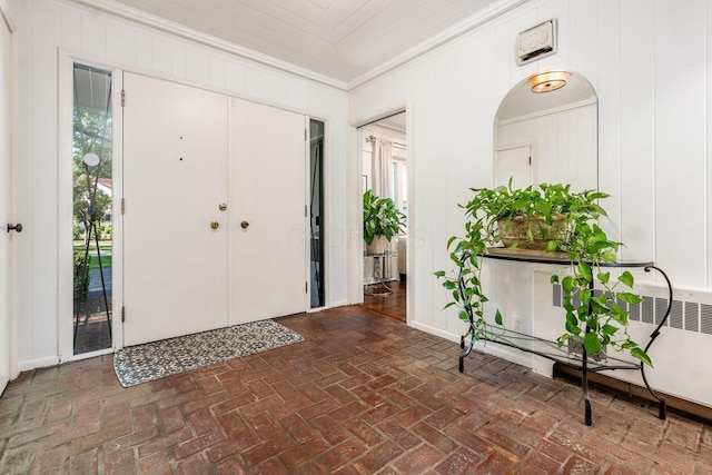 207 Ashbourne Rd, Bexley, OH 43209 - foyer with brick flooring and ornamental molding