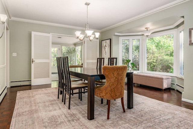 207 Ashbourne Rd, Bexley, OH 43209 - dining area featuring a chandelier, plenty of natural light, crown molding, and baseboard heating