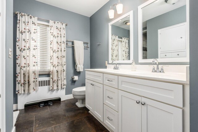 207 Ashbourne Rd, Bexley, OH 43209 - full bathroom with double vanity and toilet