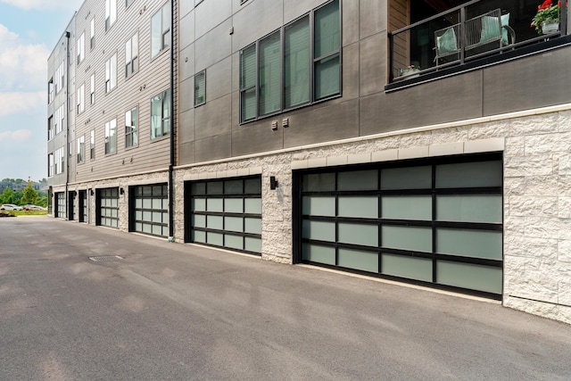 2891 Kobuk Dr Unit 301, Columbus, OH 43228 - view of building exterior with an attached garage