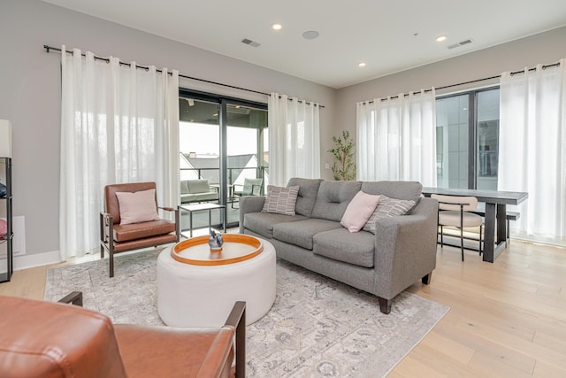 2891 Kobuk Dr Unit 301, Columbus, OH 43228 - living area featuring light wood-style flooring and recessed lighting