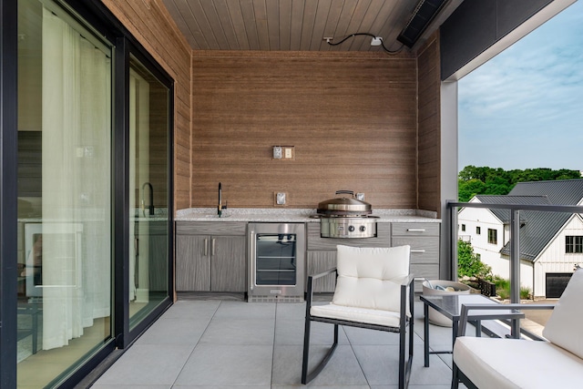 2891 Kobuk Dr Unit 301, Columbus, OH 43228 - view of patio featuring wine cooler and area for grilling