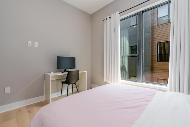 2891 Kobuk Dr Unit 301, Columbus, OH 43228 - bedroom featuring wood finished floors and baseboards