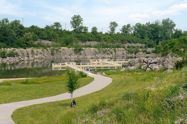 2891 Kobuk Dr Unit 301, Columbus, OH 43228 - surrounding community featuring a dock, a water view, and a lawn