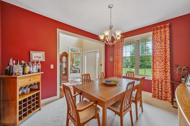 1554 Hanover Rd, Delaware, OH 43015 - dining space with light carpet and a chandelier