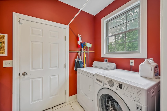1554 Hanover Rd, Delaware, OH 43015 - laundry area with independent washer and dryer and light tile patterned floors