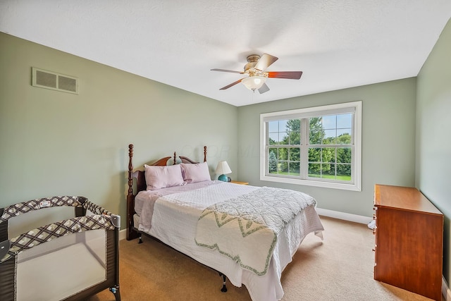 1554 Hanover Rd, Delaware, OH 43015 - bedroom with light colored carpet and a ceiling fan