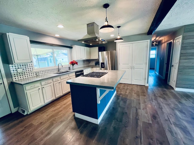 332 Baroness Way, Columbus, OH 43230 - kitchen with stainless steel fridge with ice dispenser, island exhaust hood, a textured ceiling, dishwashing machine, and gas stovetop