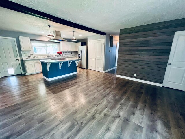 332 Baroness Way, Columbus, OH 43230 - kitchen featuring stainless steel fridge, island range hood, white cabinets, dark wood-type flooring, and a textured ceiling