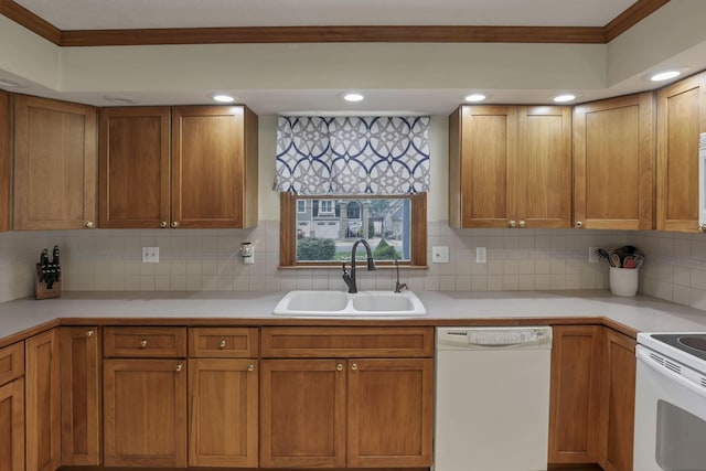 9840 Buckeye Dr, Huntsville, OH 43324 - kitchen with white appliances, light countertops, tasteful backsplash, ornamental molding, and brown cabinets