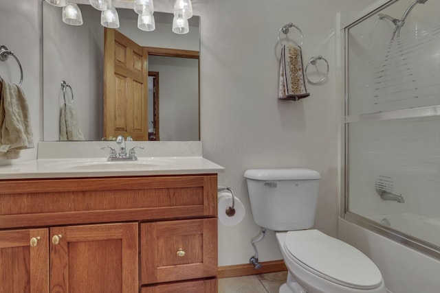 9840 Buckeye Dr, Huntsville, OH 43324 - bathroom featuring vanity, bath / shower combo with glass door, and tile patterned floors
