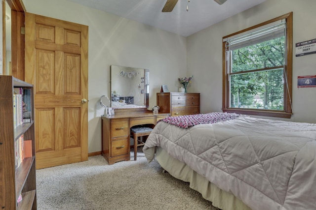 9840 Buckeye Dr, Huntsville, OH 43324 - bedroom with light carpet and ceiling fan