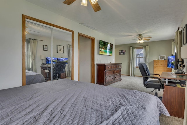 9840 Buckeye Dr, Huntsville, OH 43324 - bedroom with carpet floors, a ceiling fan, and an office area