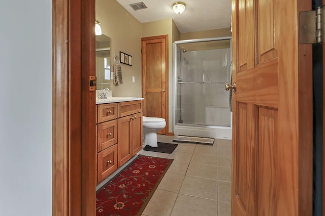 9840 Buckeye Dr, Huntsville, OH 43324 - bathroom with vanity, tile patterned flooring, and a stall shower
