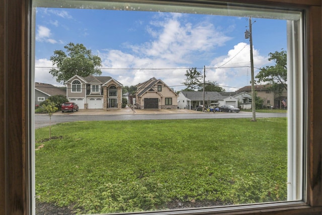 9840 Buckeye Dr, Huntsville, OH 43324 - exterior space featuring a residential view and a yard