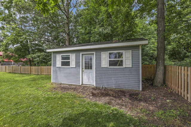 9840 Buckeye Dr, Huntsville, OH 43324 - view of outbuilding with a fenced backyard