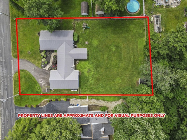 9840 Buckeye Dr, Huntsville, OH 43324 - aerial view of property and surrounding area featuring property boundaries highlighted