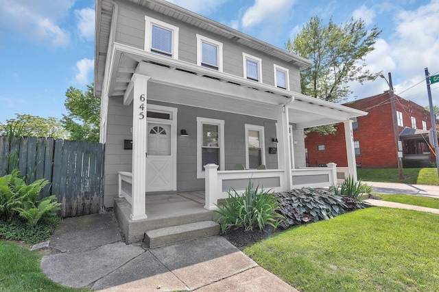 645 E 11th Ave Unit 643, Columbus, OH 43211 - view of front of home with a porch