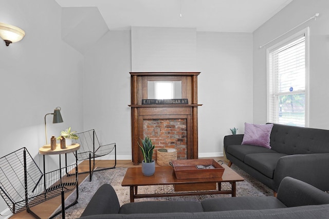 645 E 11th Ave Unit 643, Columbus, OH 43211 - living area featuring baseboards and wood finished floors