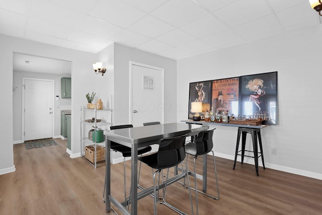 645 E 11th Ave Unit 643, Columbus, OH 43211 - dining area with a paneled ceiling and wood finished floors