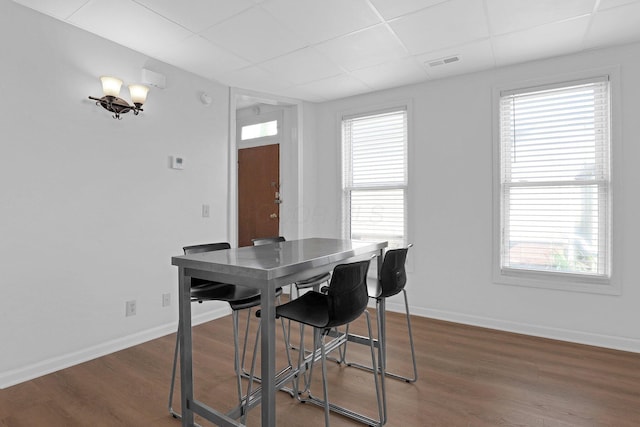 645 E 11th Ave Unit 643, Columbus, OH 43211 - dining area featuring wood finished floors and a paneled ceiling
