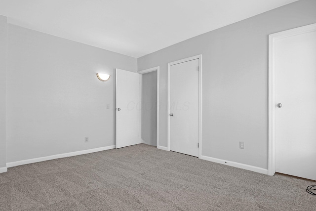 645 E 11th Ave Unit 643, Columbus, OH 43211 - unfurnished bedroom with carpet floors and baseboards
